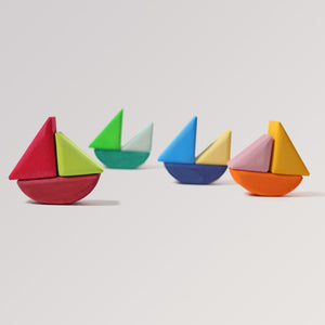 Schaukelschiffe von Grimm's (12-teilig) in 4 Farbtönen aus Holz