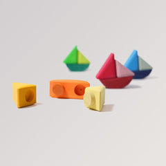 Schaukelschiffe von Grimm's (12-teilig) in 4 Farbtönen aus Holz