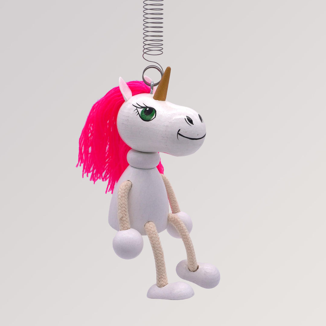 Schwingfigur Einhorn aus Holz mit Spiralfeder Menschenskinder Schwingfigur Einhorn aus Holz mit Spiralfeder Menschenskinder