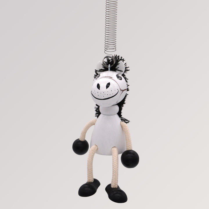 Schwingfigur Pferd an Feder von Krokido