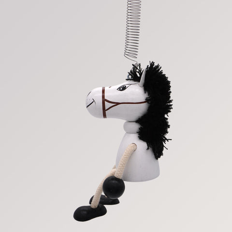 Schwingfigur Pferd an Feder seitlich von Krokido