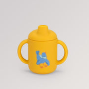 Trinkbecher des Kindergeschirr-Sets Puce & Pilou von Moulin Roty in der Farbe gelb