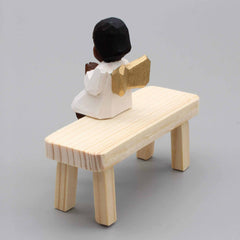 Engel, sitzend, farbig, mit gelben Söckchen von Lotte Sievers-Hahn